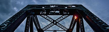 Upward view of a cloudy sky from CPR bridge in Red Deer, Alberta.